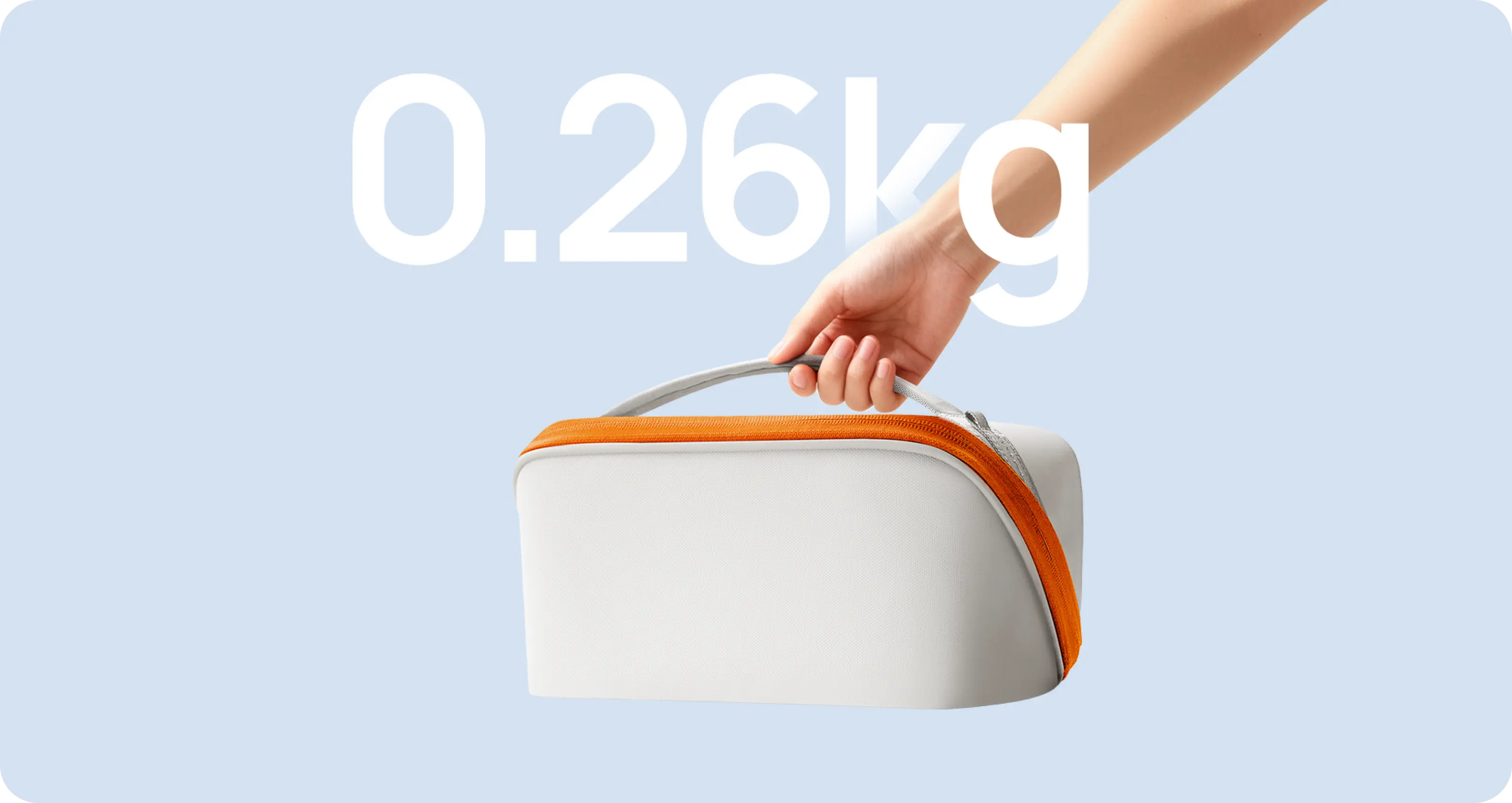 A hand holding the lightweight XGIMI MoGo 4 travel case by its ergonomic curved handle, illustrating its portability and comfortable carry.